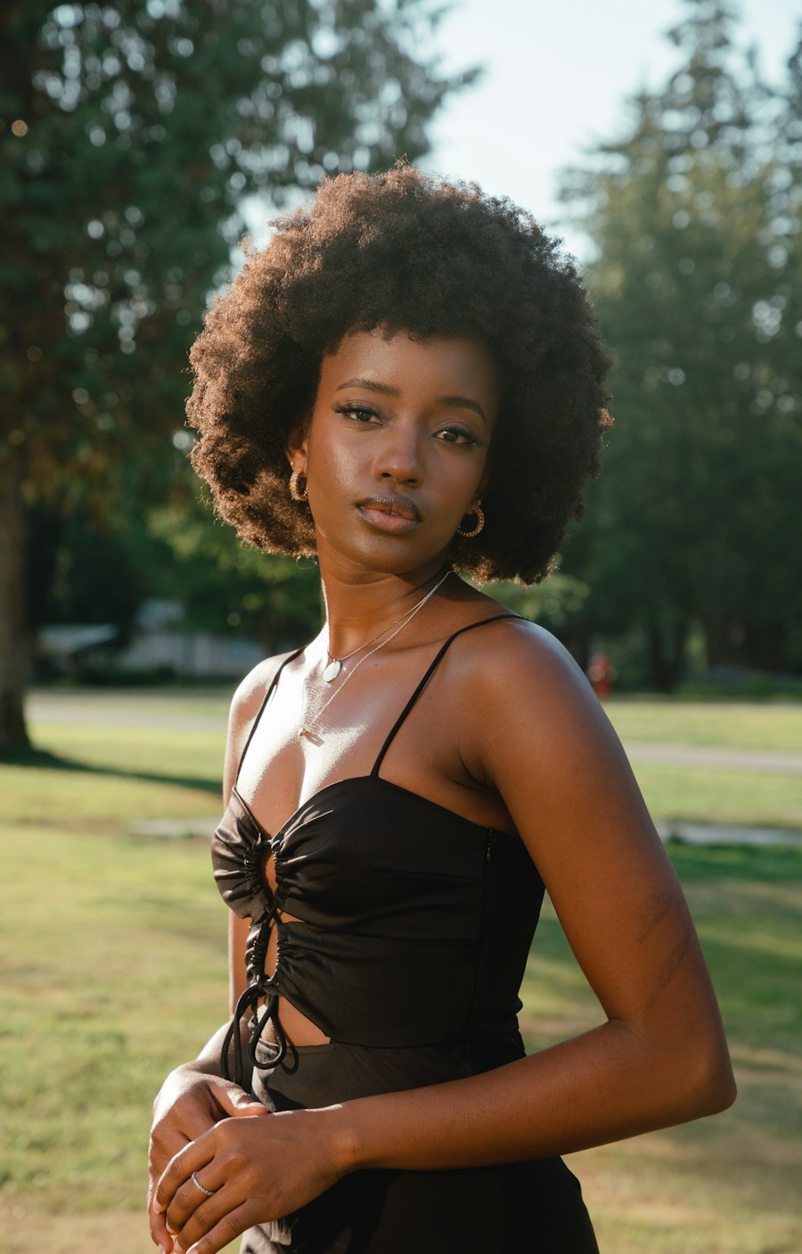 Natural curly hair portrait in warm outdoor light